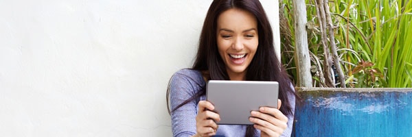 Woman entering contest on tablet