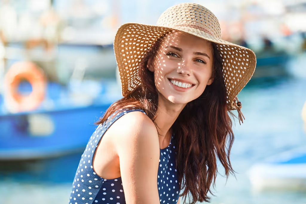 Woman smiling confidently outdoors showing off her smile